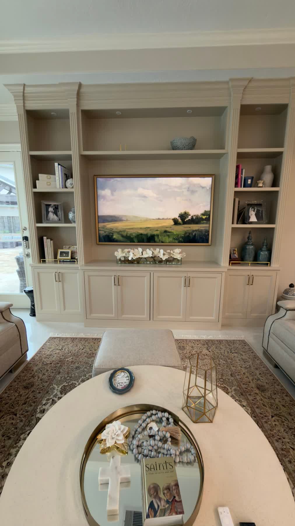 Frame TV installed in custom built-in shelving